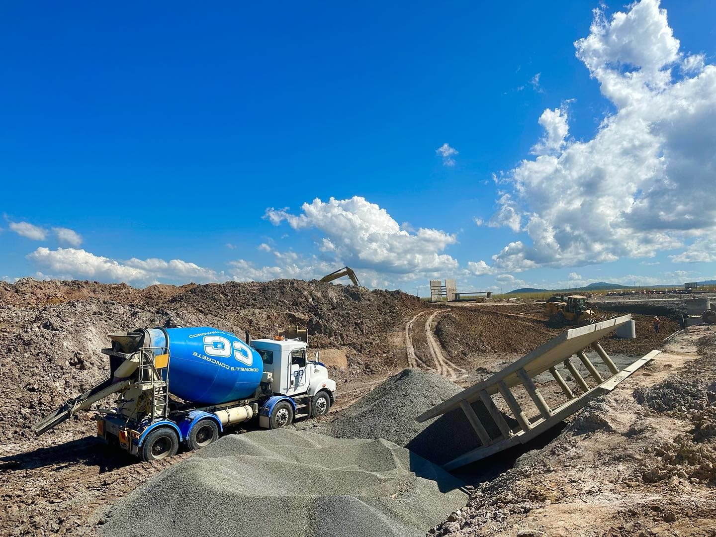 Cordwells truck delivering ready mix concrete onto a construction site 